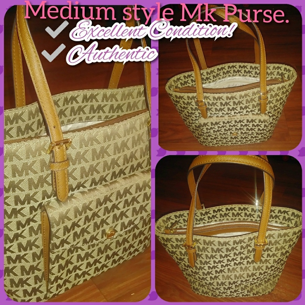 Mk monogram jet set canvas tote.